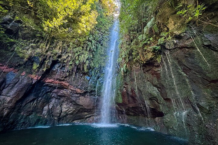 Levada do Risco waterfall cascading down cliff face
