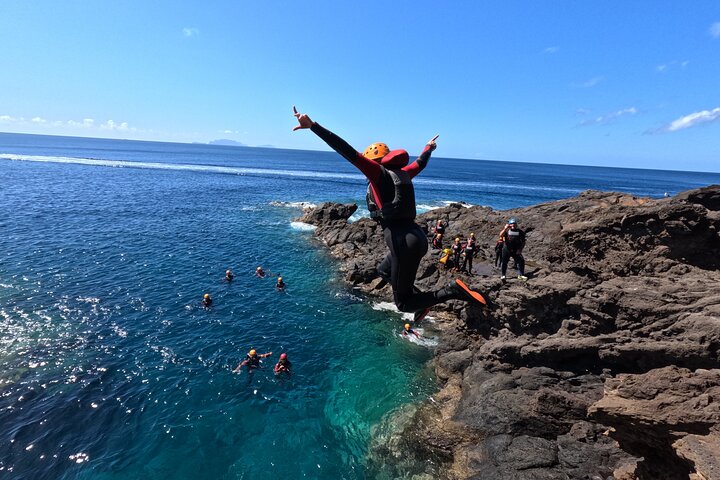 Canyoning in Madeira — descending a waterfall with rope